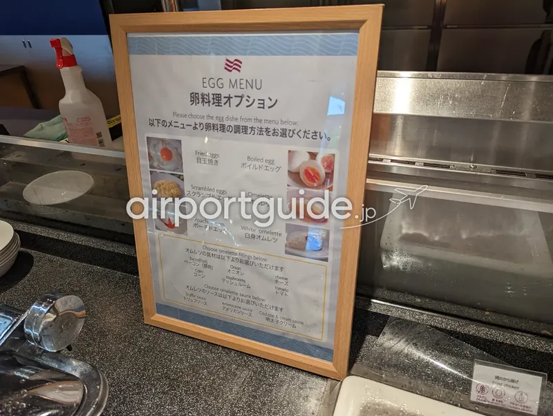 卵料理オーダー用メニュー表（額装）。目玉焼きやオムレツを選べる案内。